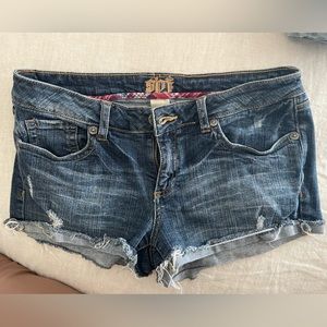 Distressed Denim Shorts with Flannel Interior pockets Women’s size L